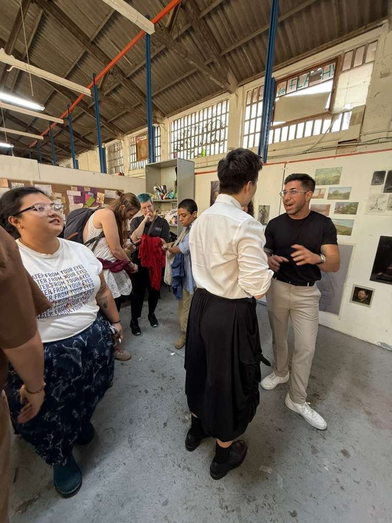 Barcelona art studio interior showing oil paintings on display during open studio event