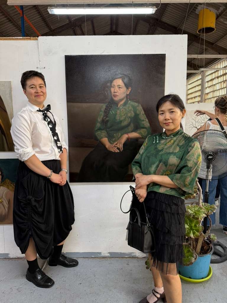 T. Cheung-Damonte interacting with visitors during Barcelona open studio art event