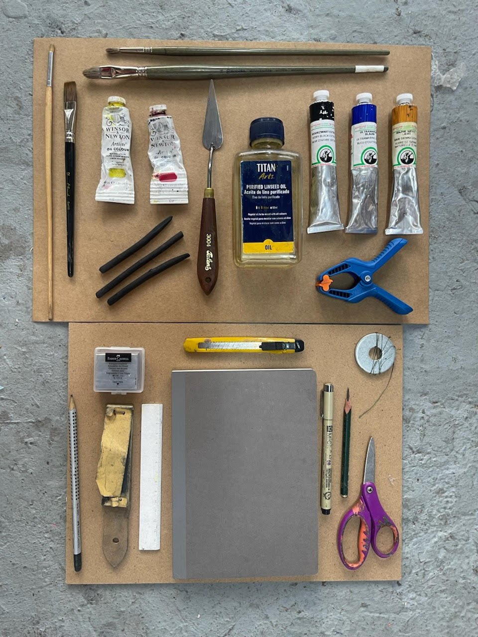 Art supplies laid out for a classical drawing and painting lesson